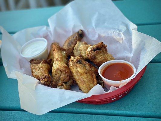 Buffalo wings with sauce on the side. $15, a bit steep for wings alone, but I'd get them again TBH #wingsarelife