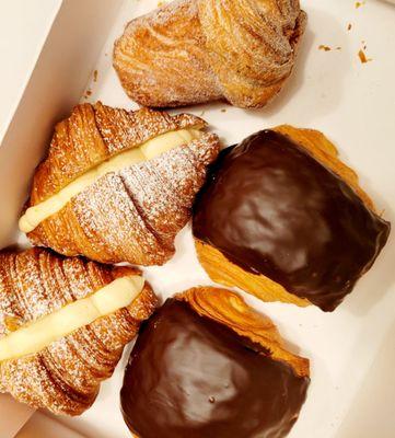 Clockwise: Creamy Croissant, Black Tea Cruffin, and Chocolate Croissants.  $22.00