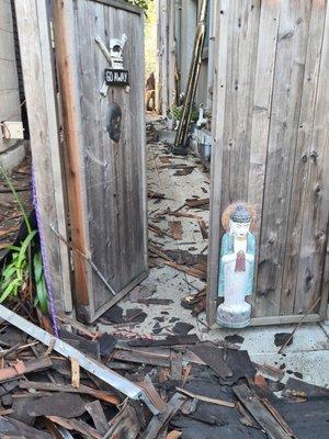 My front gate being used as a dumpster.