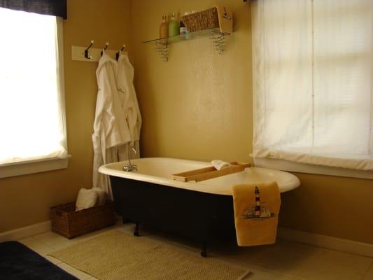 Large Bathroom including clawfoot tub and shower.