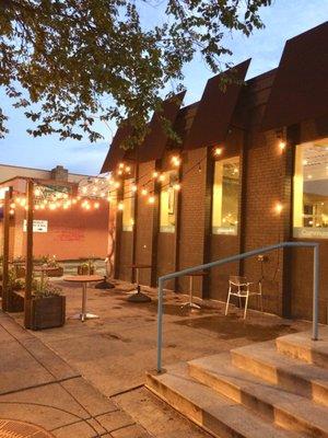 Wedge Table Outdoor Seating and String Lights