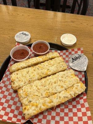 Actual bread sticks not pizza dough bread - cheesy & delicious