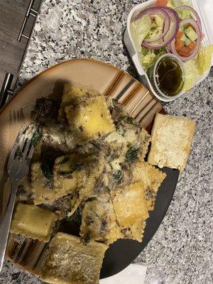 Ravioli Marsala Florentine and salad with red wine vinaigrette.