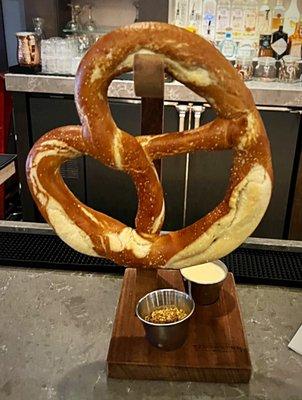 Pretty good pretzel with beer cheese and mustard.