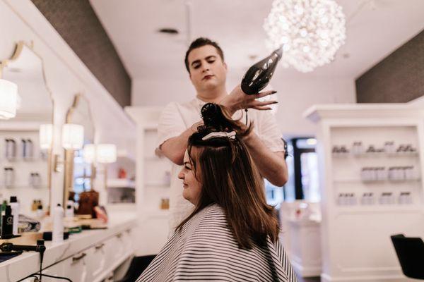 Our stylist, Jacob, gives a great blow out!