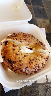 Everything Bagel with cream cheese, tomato, and cucumbers