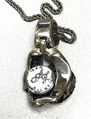 Pendant stamped AG