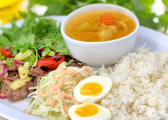 All day set #3, Yellow curry chciken, boiled egg, spicy beef salad $11.95