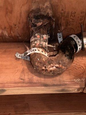 Old corroded shower drain pipe