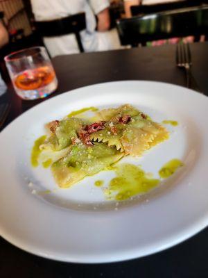 Agnolotti with English pea and Ricotta- Pancetta, Grana Padano, and Mint oil ($18 or $28 for full.) Excellent pasta.