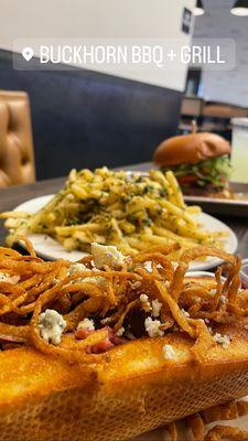 Buckhouse blue cheese tri tip sandwich , garlic fries and a tri tip burger!