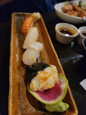 Chopped scallop, scallop, superwhite and salmon nigiri.