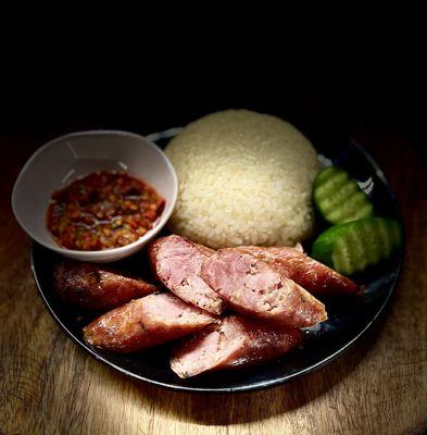 Pork Ginger Sausage with Sticky Rice and a side of pepper sauce