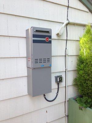 Your tankless water heater does not always have to go inside of your home! Make some space inside!