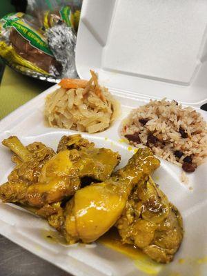 Curry chicken, rice & peas  & steamed cabbage