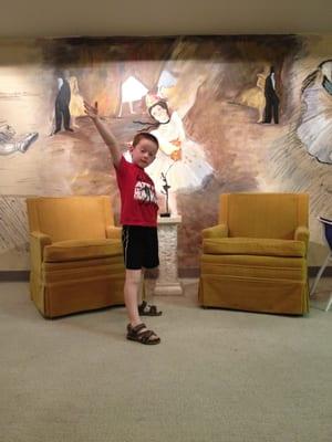 My son demonstrating his ballet moves while we wait for his sister to finish voice lessons!