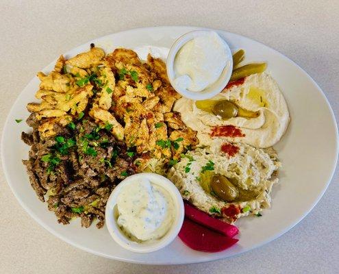 mix shawarma beef & chicken, rice, hummus, baba g. garlic dip, tzatziki, pickles