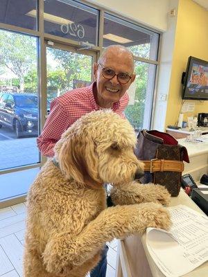 Beau paying his bill upon discharge.