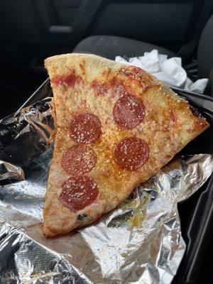 By the slice?  Excessively greasy and soggy...with an OK flavor.  Maybe if you order a whole pie, it would be different.