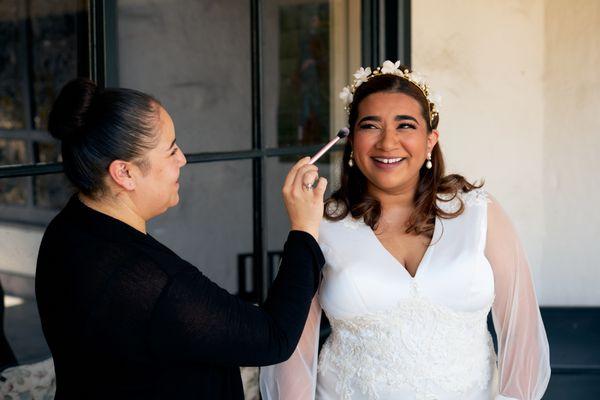 Judy working on my makeup at the Church of the Wayfarer