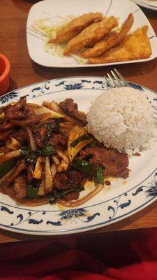 Mongolian beef. And crab Rangoon in the back