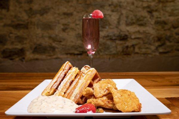 Chicken & Waffles with house made sausage gravy.