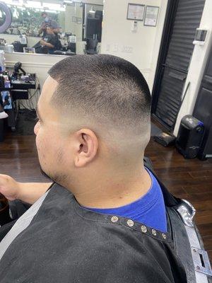 Mid Bald Fade Haircut by Anibal