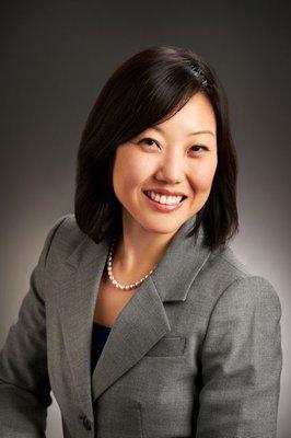 Julie Park, DMD. Board Certified Oral Surgeon.