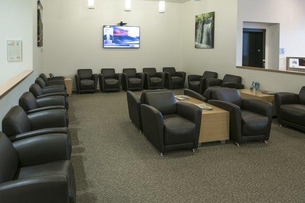 Comfortable customer waiting lounge with complimentary bagels, coffee, wi-fi, and a separate quite area.