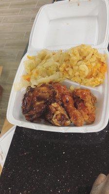 Our Mac and cheese with fry chicken and jerk chicken.