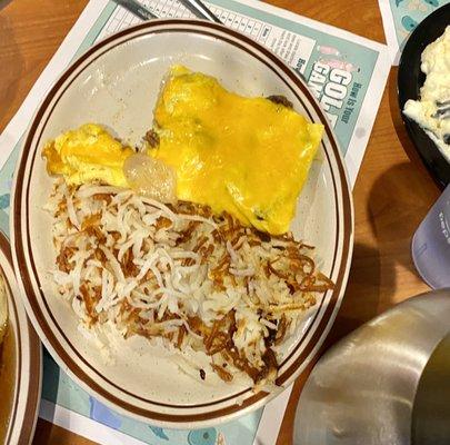 Liver n onion omelette with hash browns.