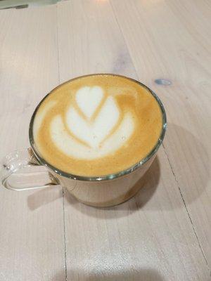 Our oat milk latte made with our in house vanilla syrup.