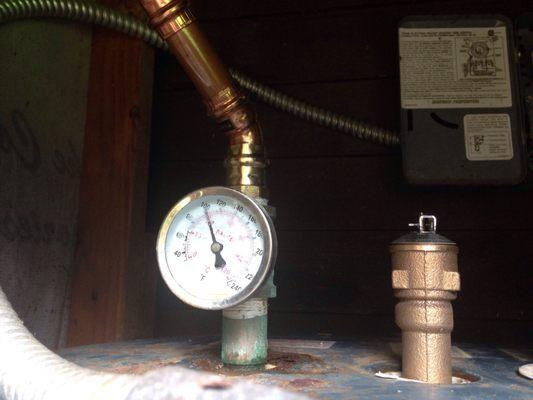 New relief valve and new water line above existing temp gauge