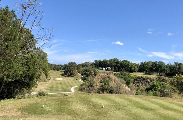 #13.  Tee shot is down in the quarry then uphill shot to elevated green