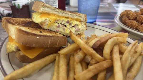 Breakfast sammich and fries.