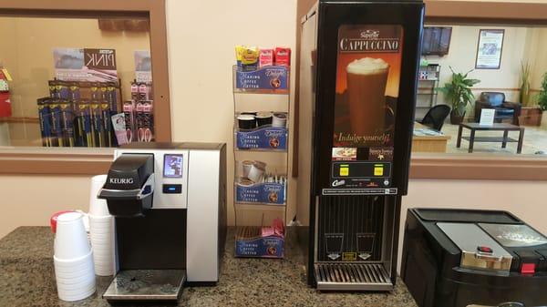 Complimentary coffee (Keurig and Cappuccino machine) and snacks