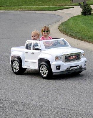 Cole and Olivia cruising in their GMC!