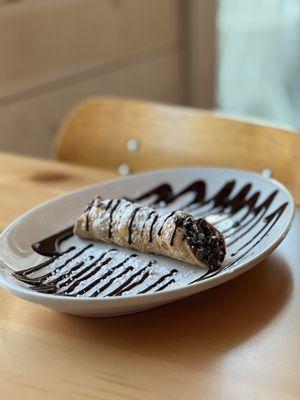 Cannoli (order came with three - we ate one while dining in and took the other two to go)!