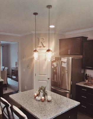 Pendant lights installed over kitchen island