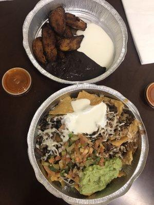 Plaintains and super nachos with carne asada and carnitas