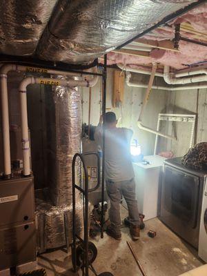 Shawn doing a great job installing the new tank.