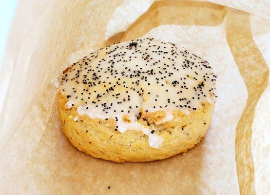 $3.85 Vegan Lemon Poppy Seed Scone, yum! Crispy in the outside, thick, moist & fluffy on the inside w/swet lemon glaze & poppy seeds on top.