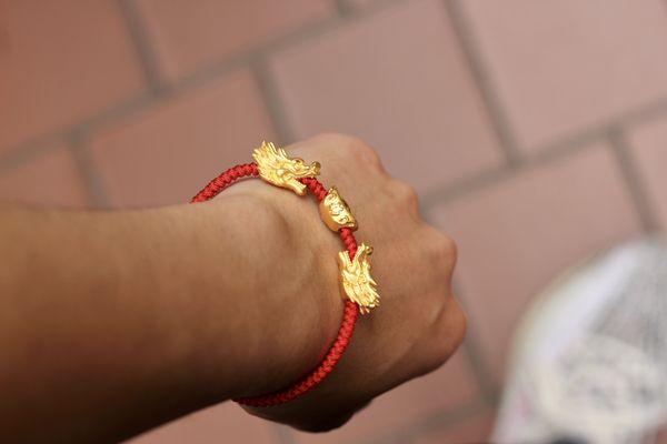 24K Yellow Gold dragon heads strung with traditional Chinese Red String with Red Agate!