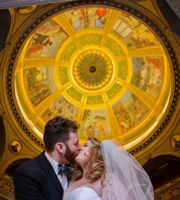 This pi day wedding photograph (3.14.15) captures the beauty of the mural in the central globe of the library.