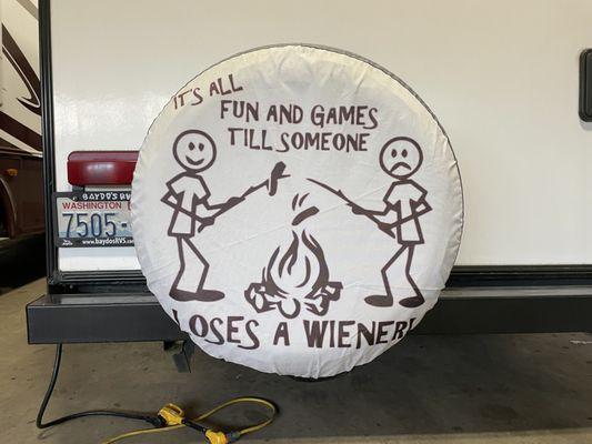 This tire cover is hilarious! Cheers to the owners of this RV in for service at Ernie's Inc. :-)