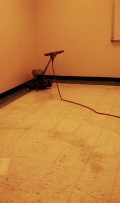 BEFORE: Tile floor stripped