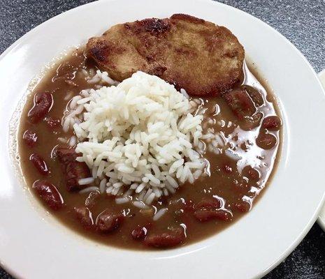 RED BEANS AND RICE WITH A BREADED PORK CHOP