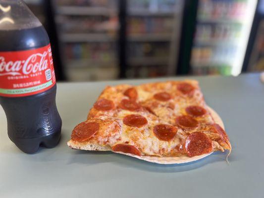 2 Delicious pepperoni slices paired with a 20oz Coke