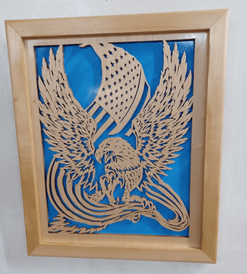 Framed eagle with flag with enhanced blue background.