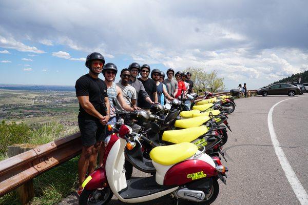 Bachelor party on motor scooters on Lookout Mountain west of Golden Colorado